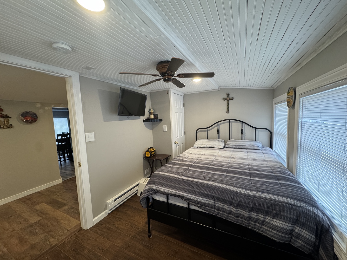 2-280 Woodhaven Sublette, IL 61367 - Photo 16 of 17 a bedroom with a bed and a ceiling fan