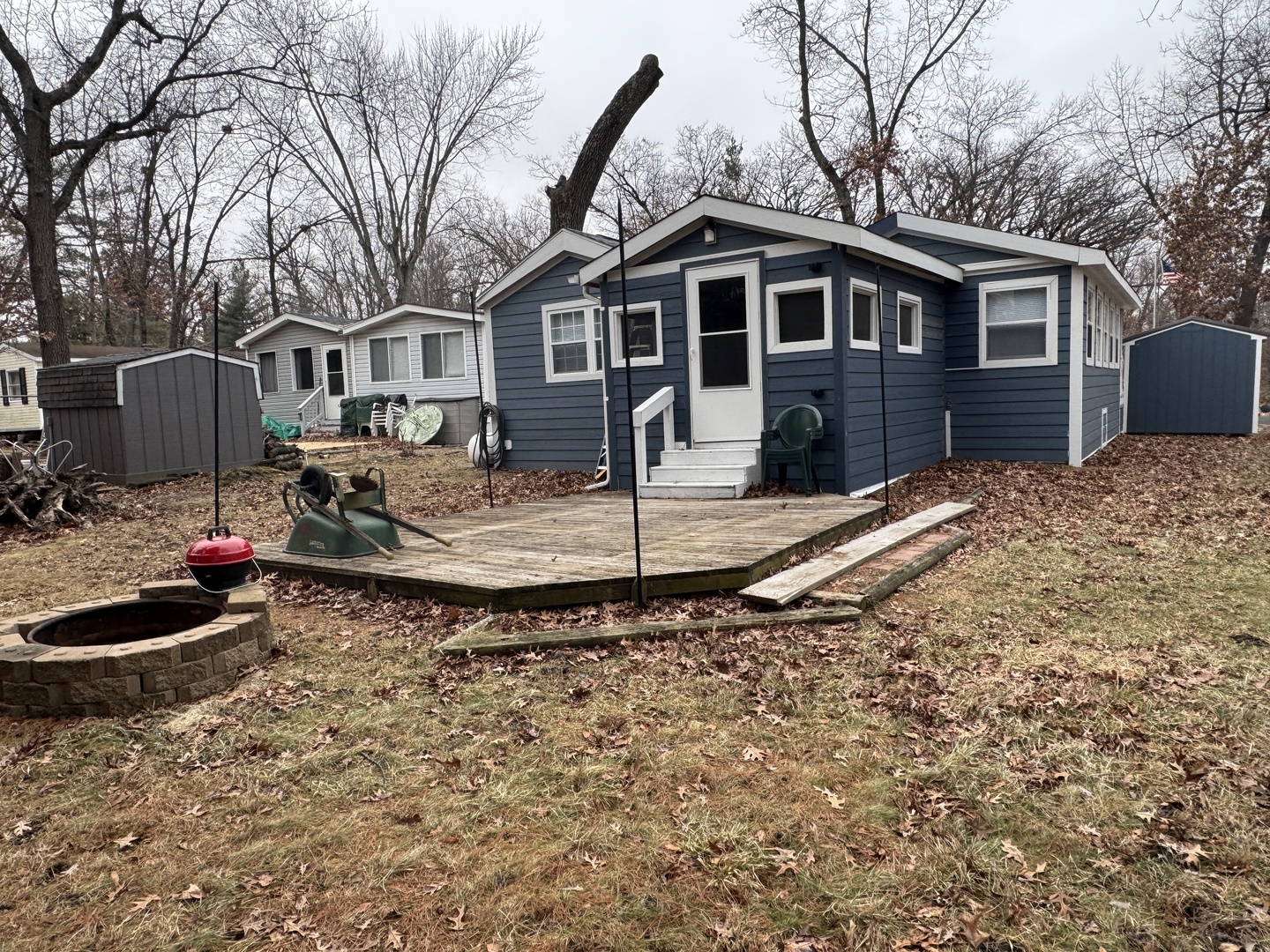 2-280 Woodhaven Sublette, IL 61367 - Photo 3 of 17 a front view of a house with entertaining space