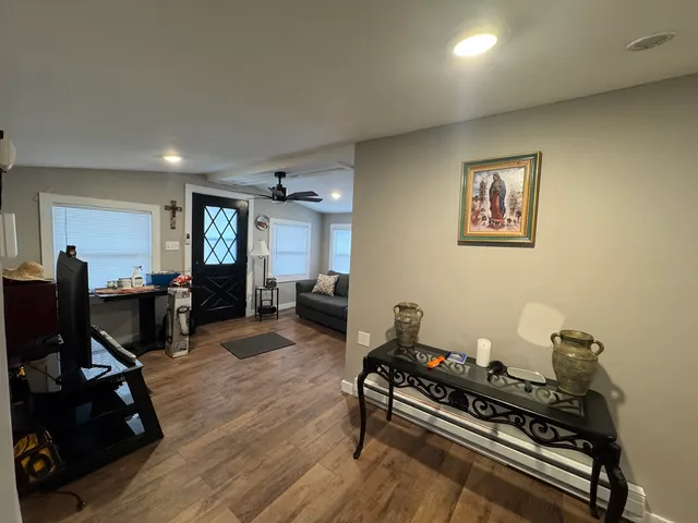 a kitchen with kitchen island granite countertop stainless steel appliances lots of counter top space