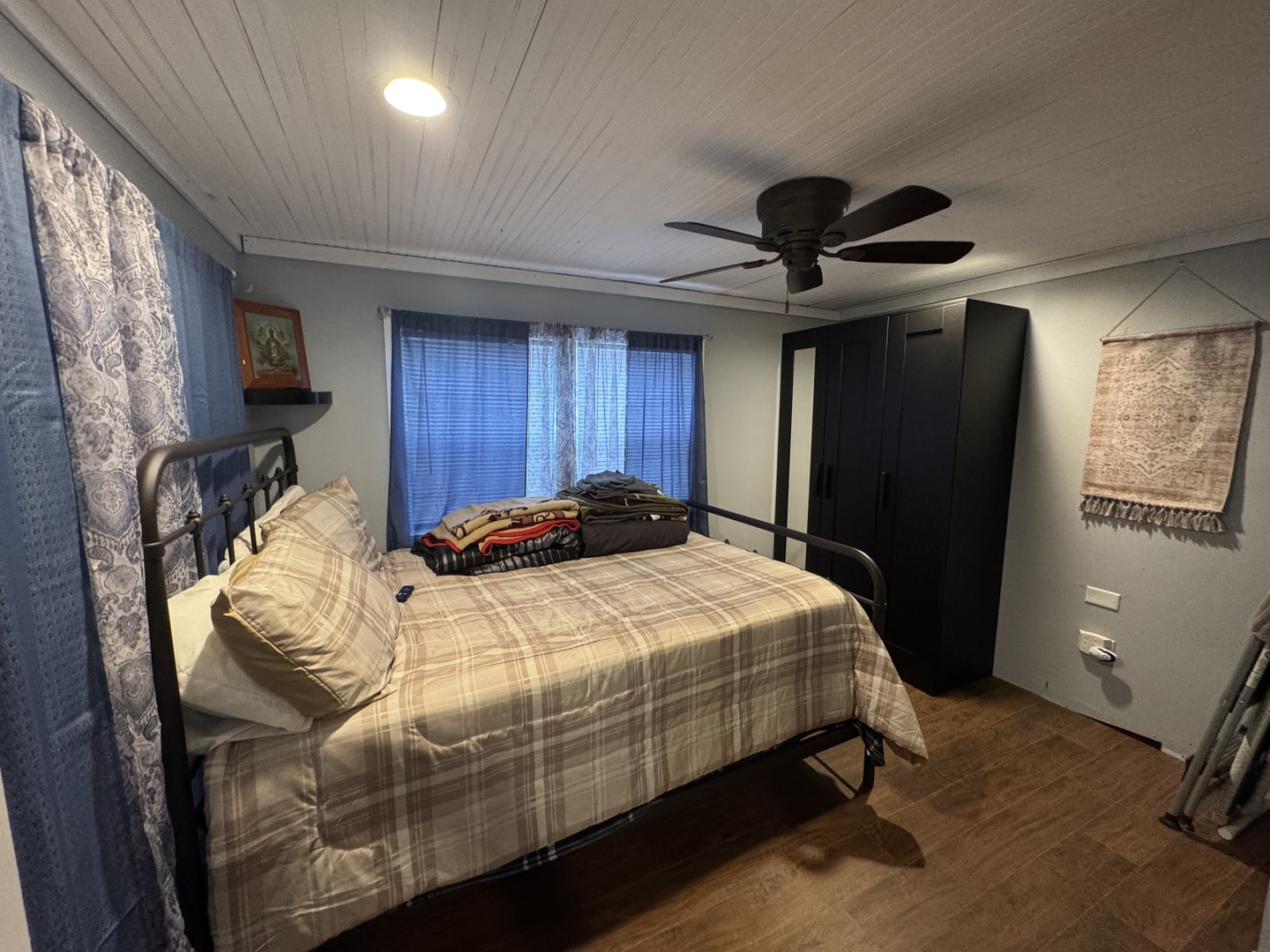 2-280 Woodhaven Sublette, IL 61367 - Photo 10 of 17 a bedroom with bed and a chandelier