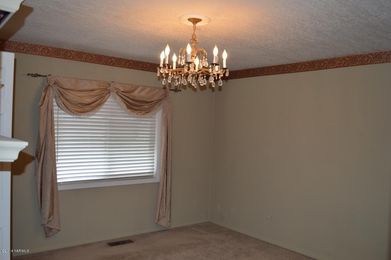 7007 Bell Road Yakima, WA 98901 - Photo 9 of 15 a view of a chandelier in a room