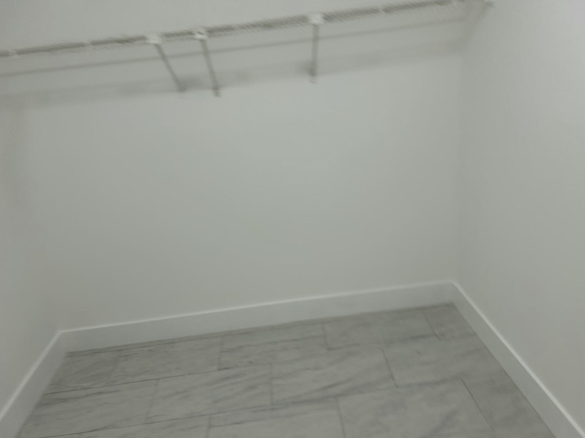 701 North Pine Island Road, Unit 304 Plantation, FL 33324 - Photo 37 of 77 a view of a room with empty racks