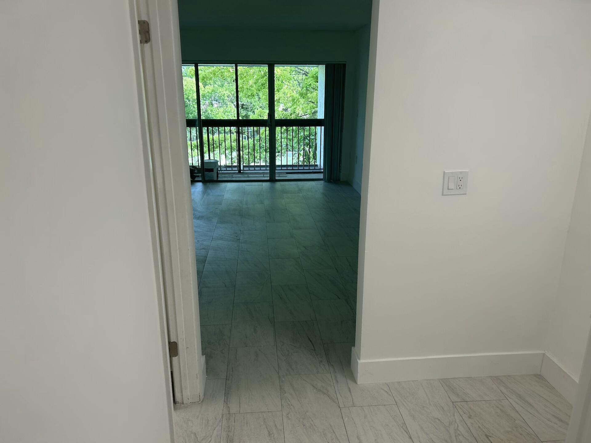 701 North Pine Island Road, Unit 304 Plantation, FL 33324 - Photo 40 of 77 a bathroom with a window