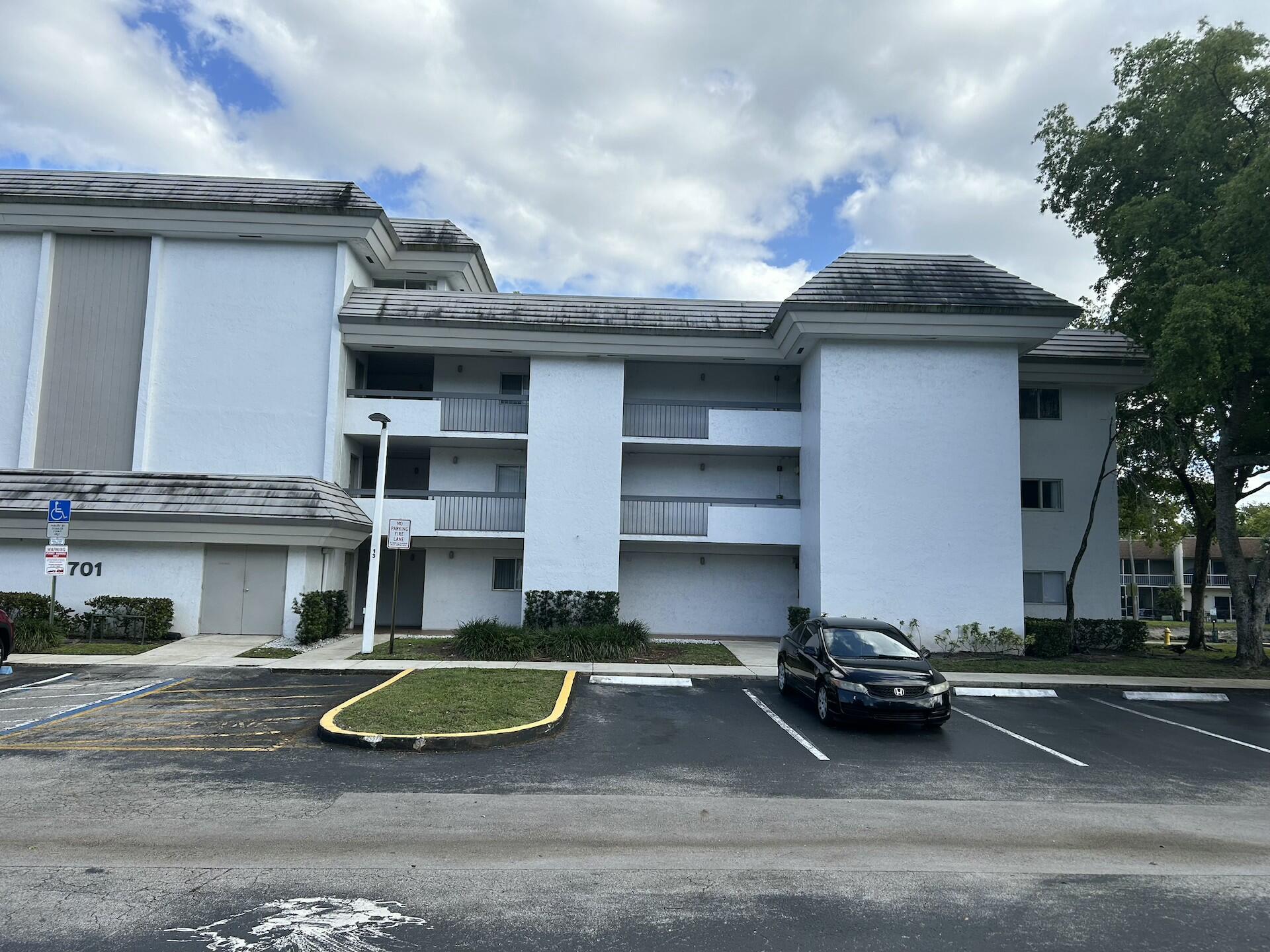 701 North Pine Island Road, Unit 304 Plantation, FL 33324 - Photo 69 of 77 a view of a house with a yard and sitting area