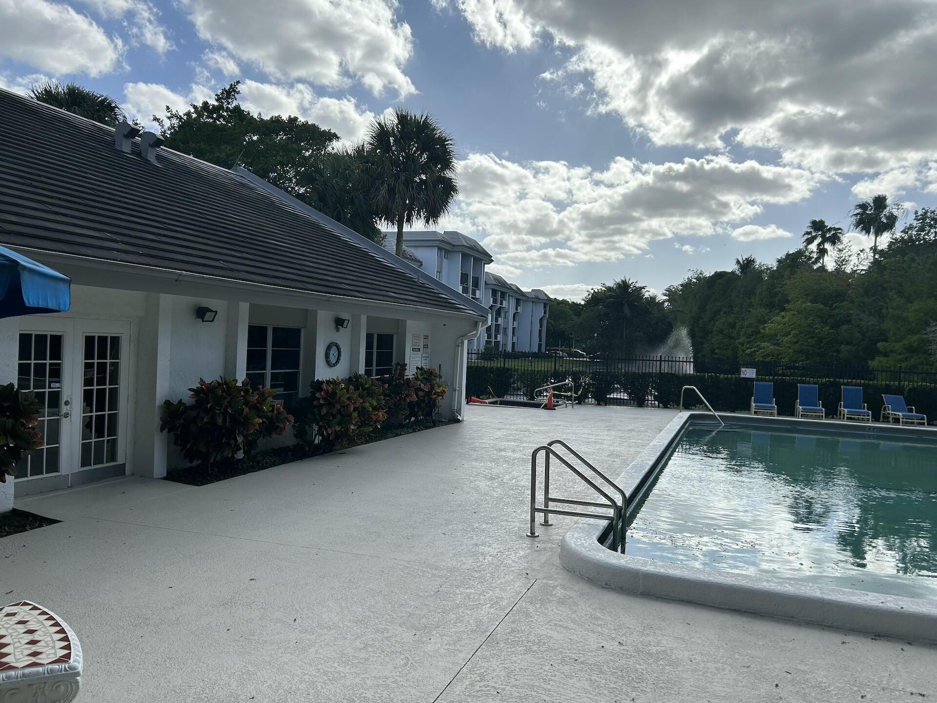 701 North Pine Island Road, Unit 304 Plantation, FL 33324 - Photo 71 of 77 a view of a terrace with a sitting area