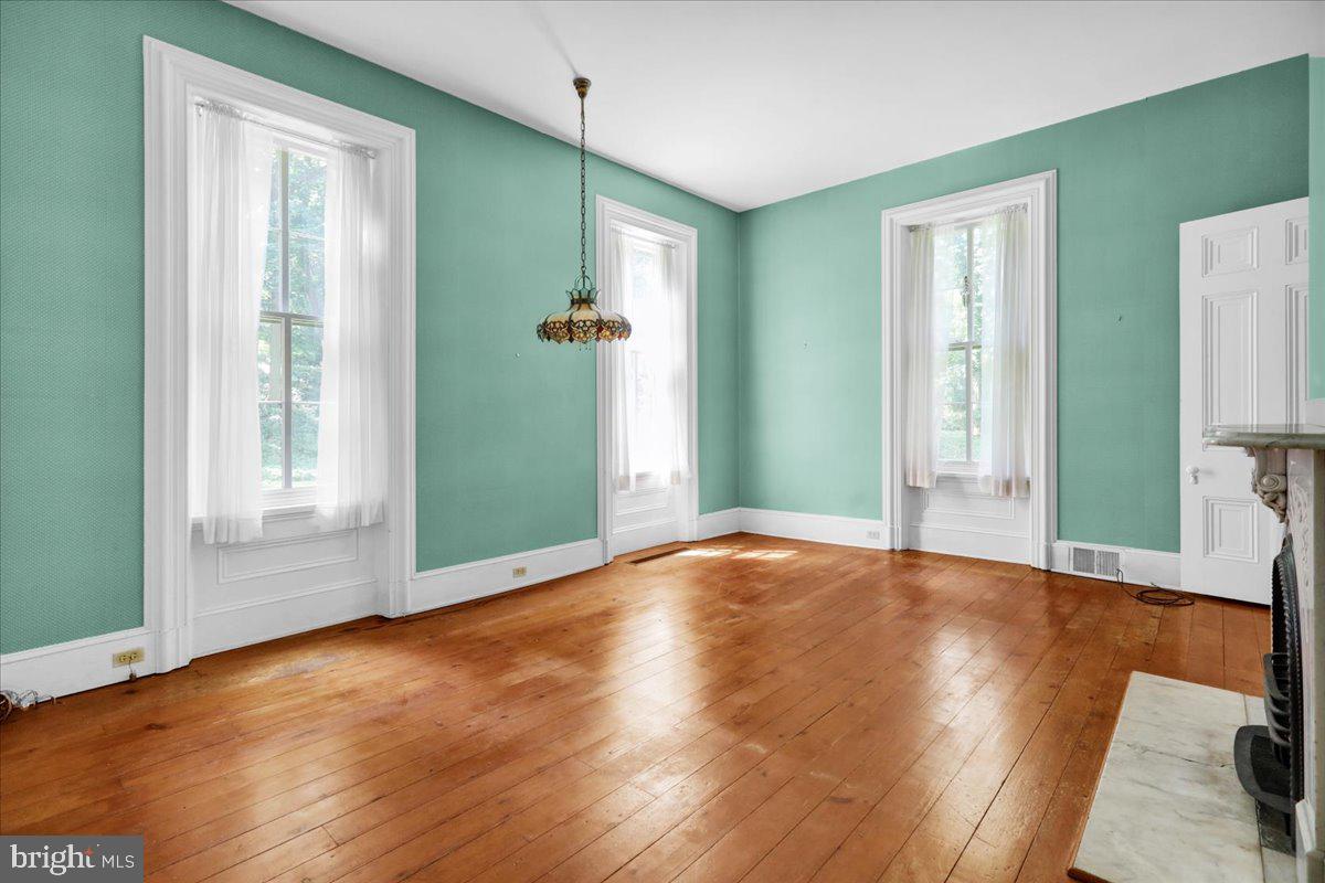 1670 Moselem Spring Road Hamburg, PA 19526 - Photo 24 of 78 a view of an empty room with wooden floor and a window