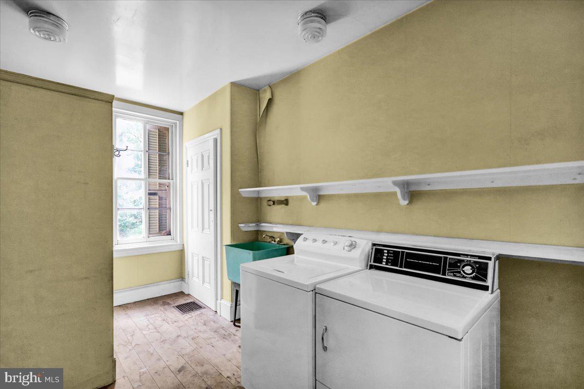1670 Moselem Spring Road Hamburg, PA 19526 - Photo 32 of 78 a view of storage and utility room with washer and dryer