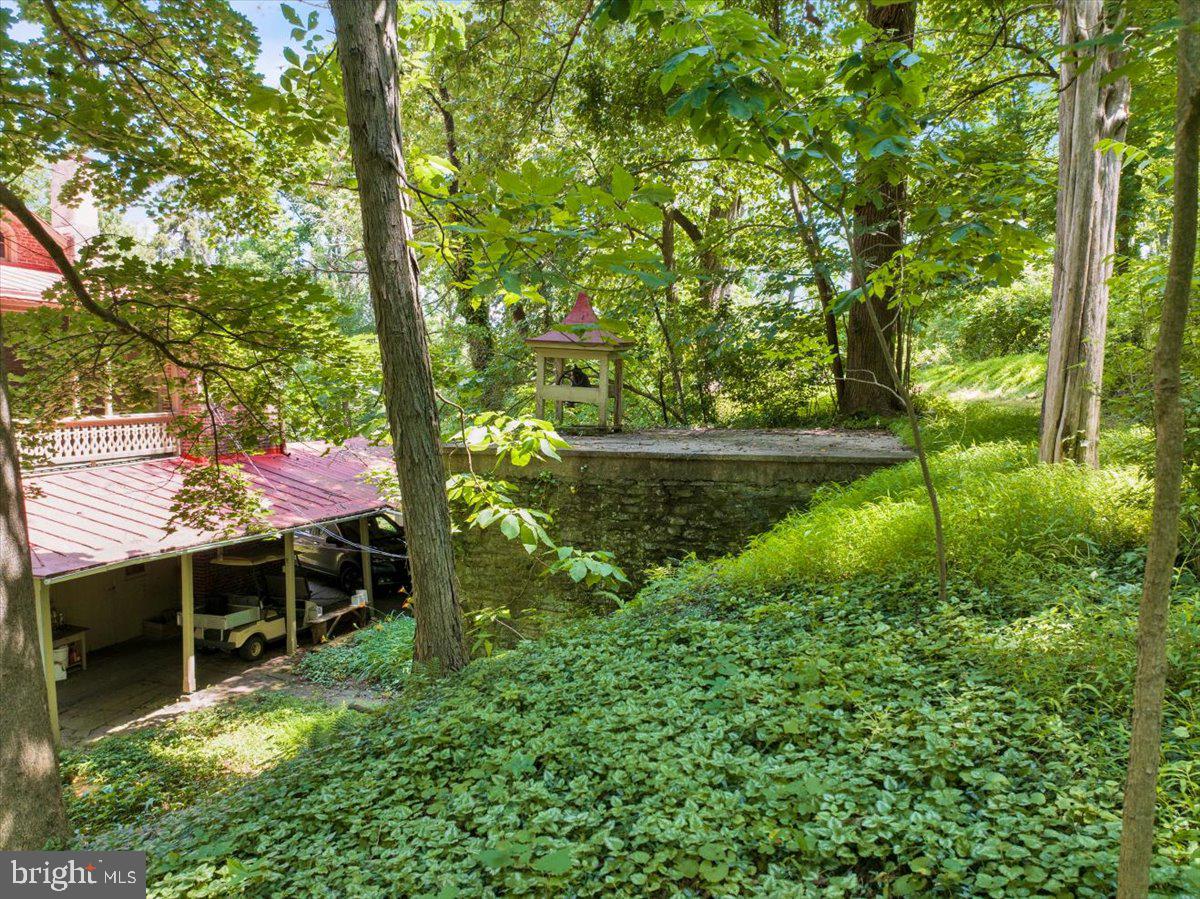 1670 Moselem Spring Road Hamburg, PA 19526 - Photo 65 of 78 a view of backyard with table and chairs and potted plants