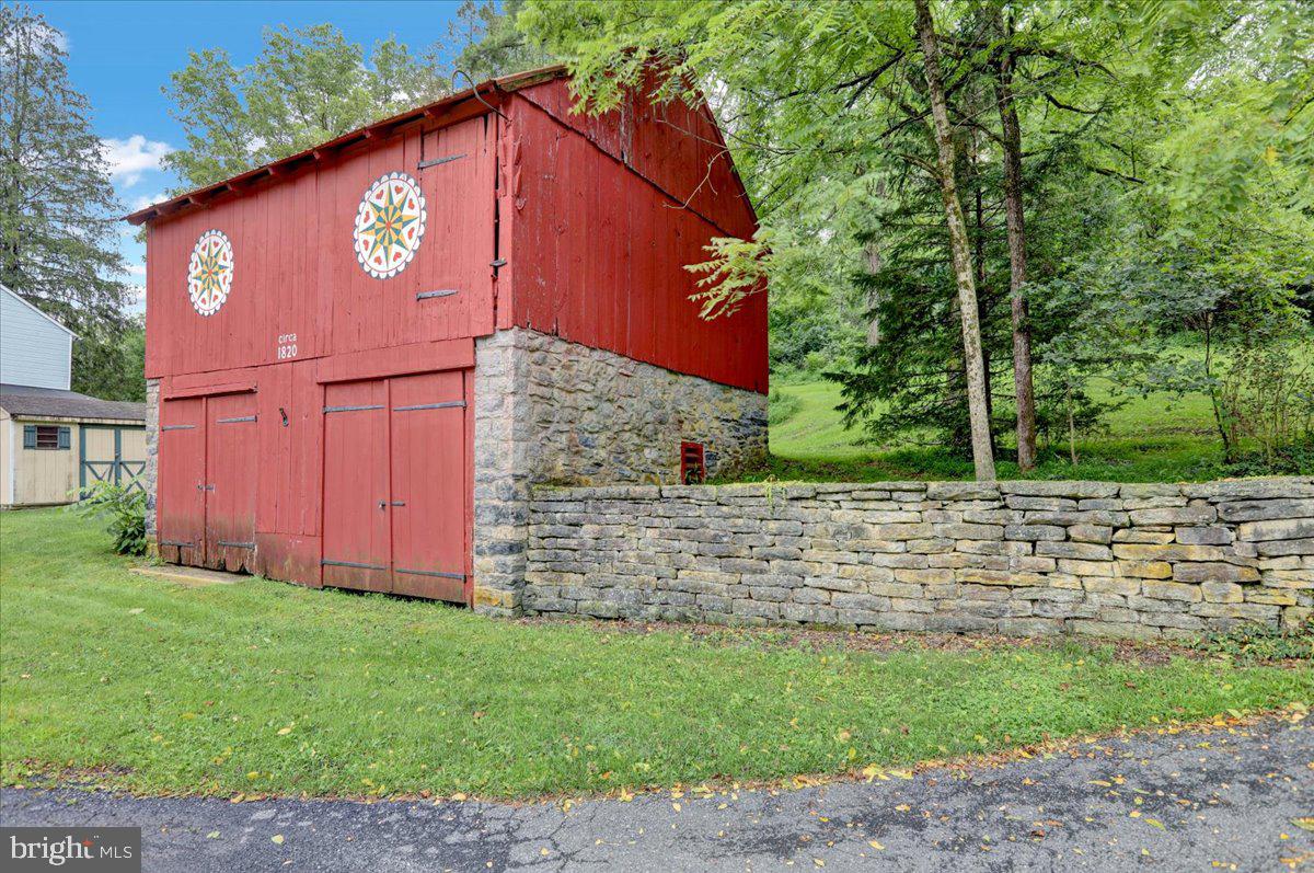 1670 Moselem Spring Road Hamburg, PA 19526 - Photo 70 of 78 a view of a yard with brick wall