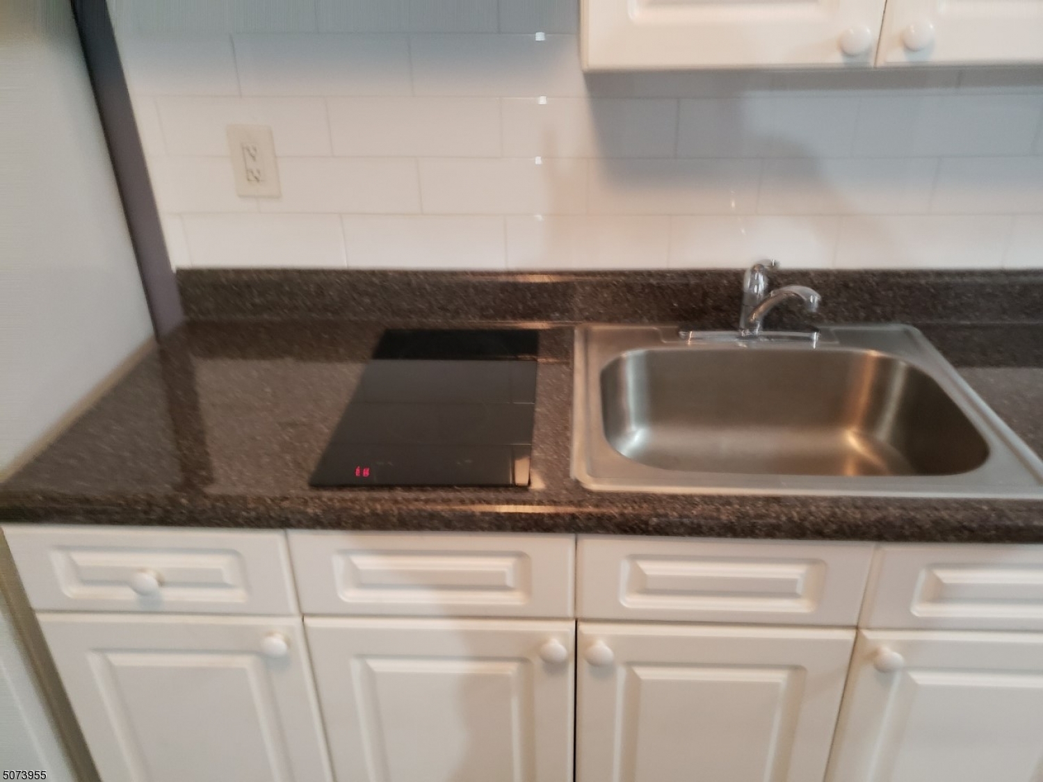 634 Magnolia Avenue, Unit 1 Elizabeth Port, NJ 07206 - Photo 2 of 12 a close view of sink and tap