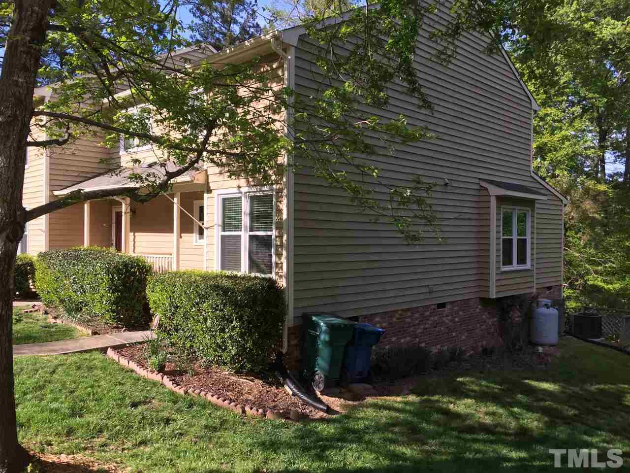 Heritage Woods HOA maintain the exterior of the dwelling: roof, siding, DECK, grounds / landscaping, common areas. There are 2 parking spots for this end unit town home. Dwelling is wired for security system.