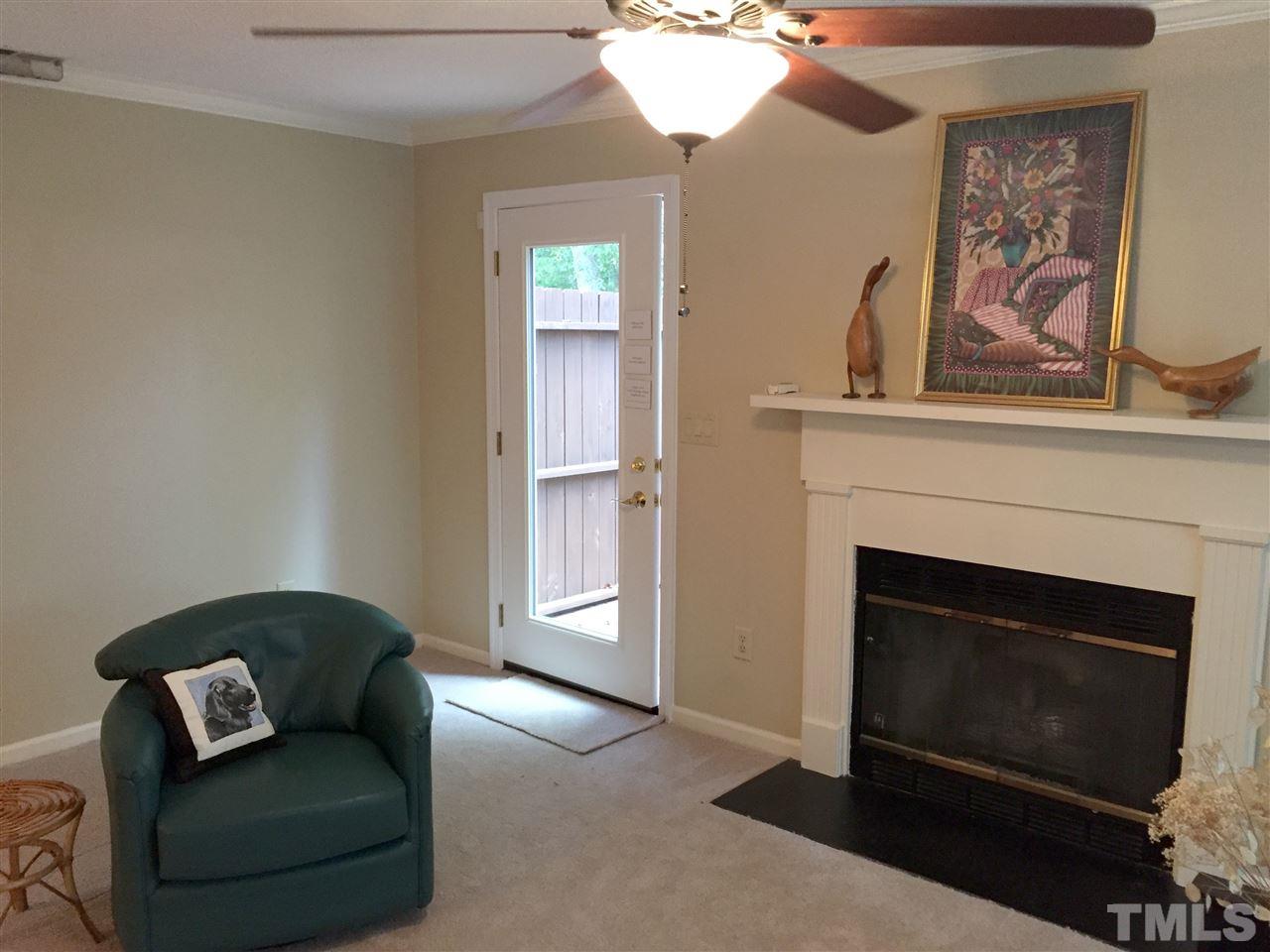 134 Timber Ridge Drive Durham, NC 27713 - Photo 11 of 25 New carpet installed prior to listing. Gas log fireplace is Living Room's focal point and the bumped out window allows sunlight from the lovely woods of Woodcroft. Replacement door leads to oversized deck. Lighted ceiling fans can operate remote control.