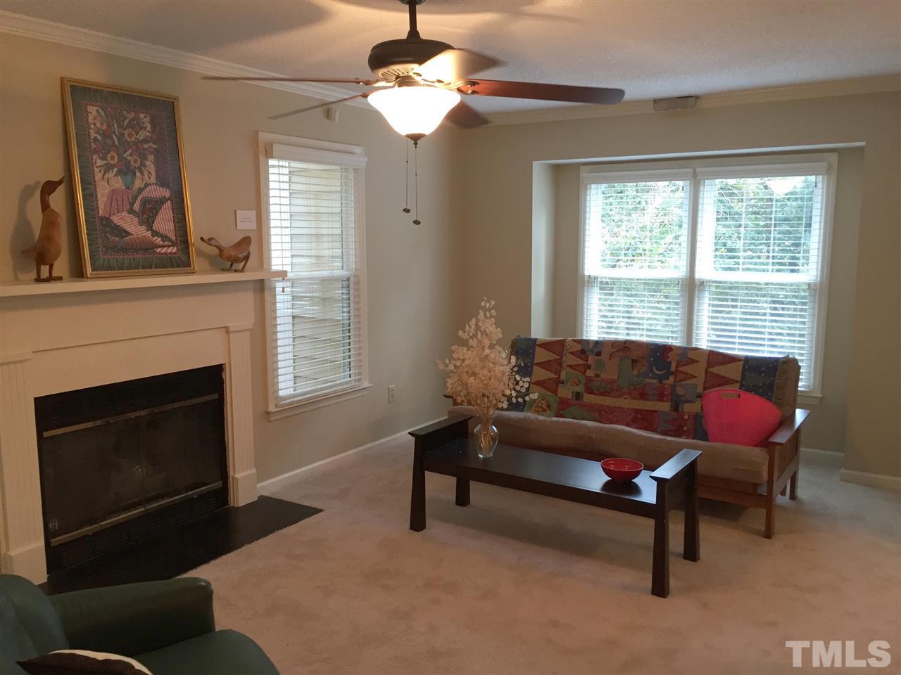 134 Timber Ridge Drive Durham, NC 27713 - Photo 12 of 25 New carpet installed prior to listing. Gas log fireplace is Living Room's focal point and the bumped out window allows sunlight from the lovely woods of Woodcroft. Replacement door leads to oversized deck. Lighted ceiling fans can operate remote control.