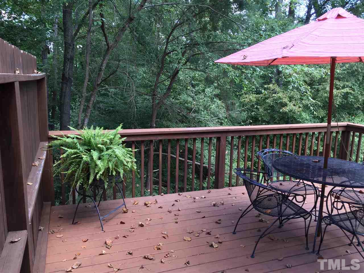 134 Timber Ridge Drive Durham, NC 27713 - Photo 13 of 25 Oversized deck possibly the largest in Heritage Woods overlooks the woods and walking trail.