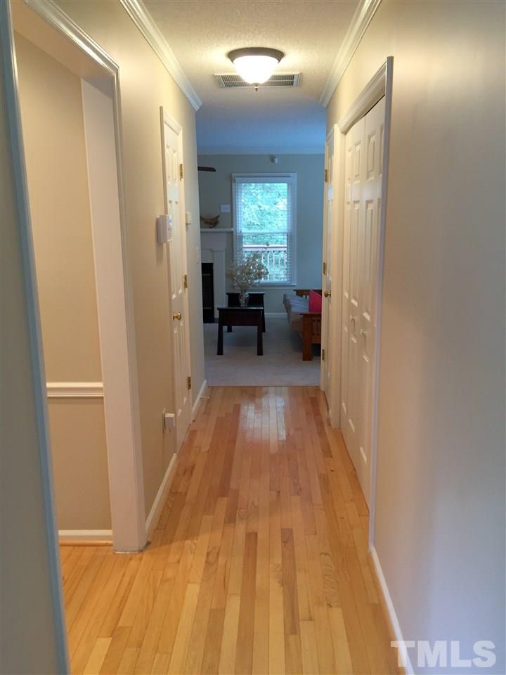 Sunny toned hardwood flooring welcomes you into this fresh and comfortable two story townhome.