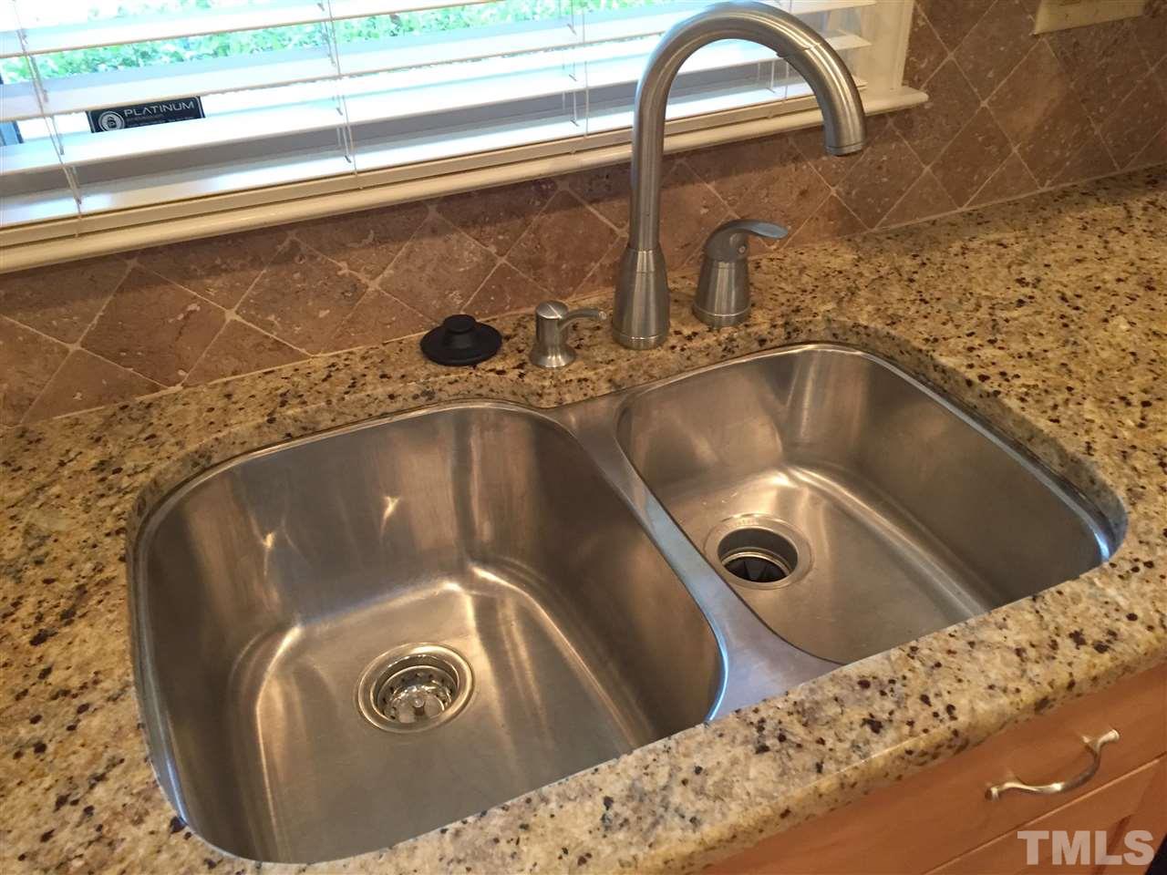 Double integrated stainless sink.