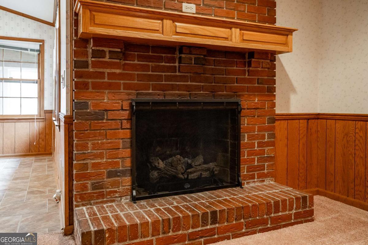 389 Ashton Drive Athens, GA 30606 - Photo 20 of 72 a living room with a fireplace