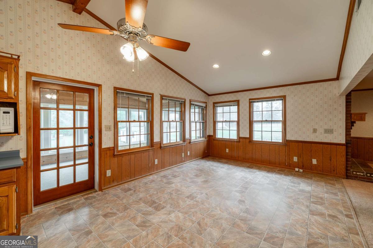 389 Ashton Drive Athens, GA 30606 - Photo 22 of 72 a view of an empty room with a window and a bathroom