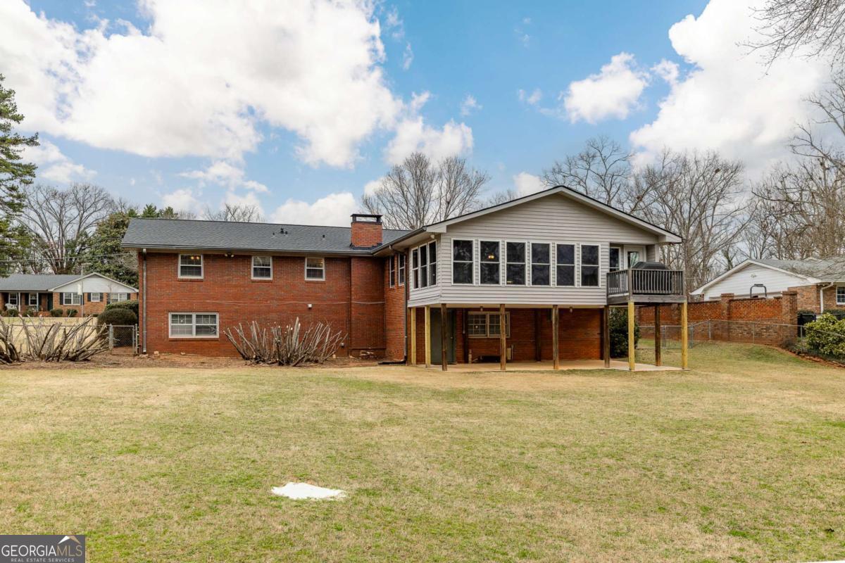 389 Ashton Drive Athens, GA 30606 - Photo 69 of 72 a front view of a house with a yard