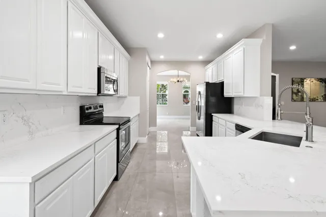 front view of the house and a yard