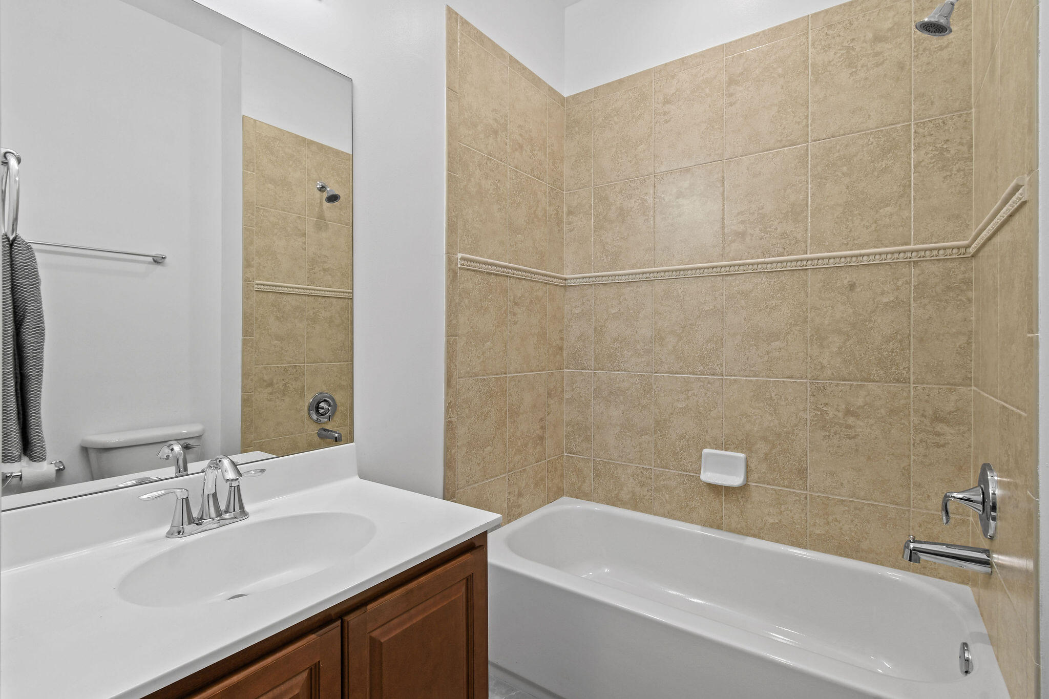 111 Tullamore Avenue Jupiter, FL 33458 - Photo 26 of 64 a bathroom with a sink and a bathtub