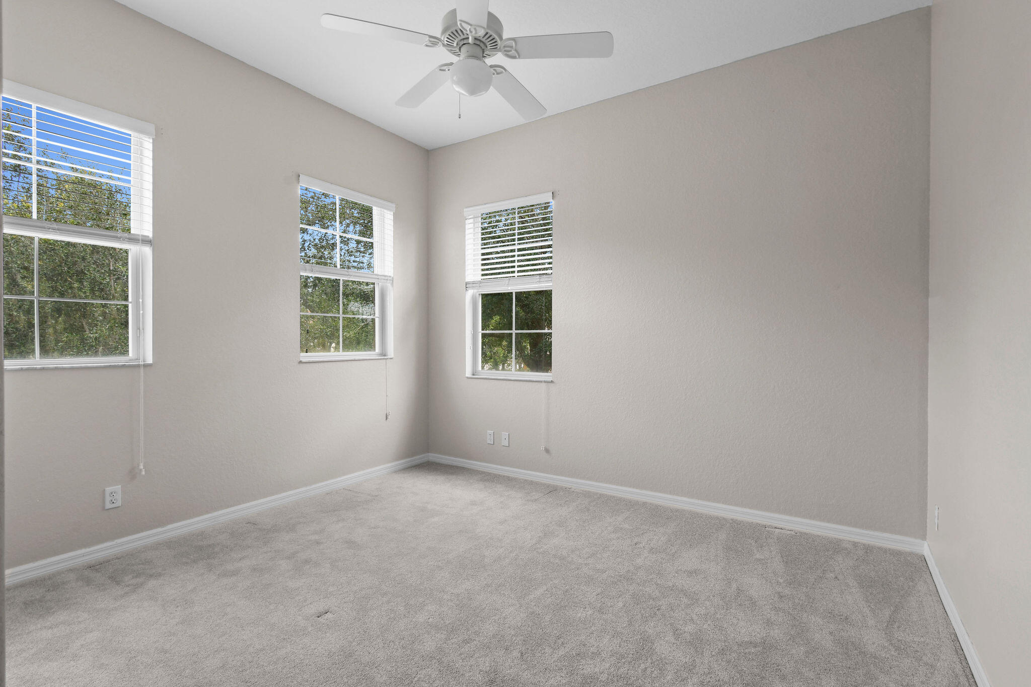 111 Tullamore Avenue Jupiter, FL 33458 - Photo 35 of 64 an empty room with a window