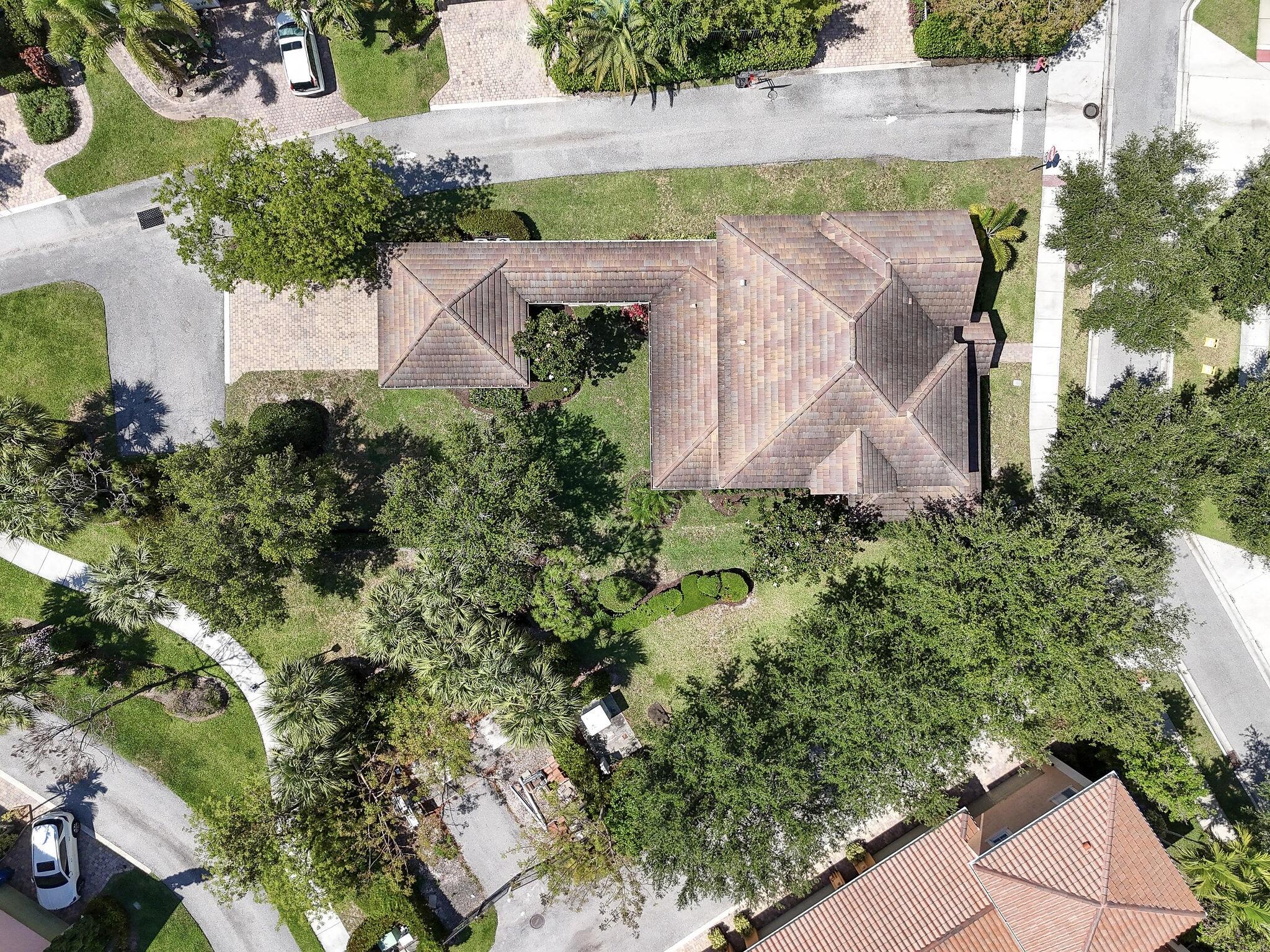 111 Tullamore Avenue Jupiter, FL 33458 - Photo 4 of 64 an aerial view of a house