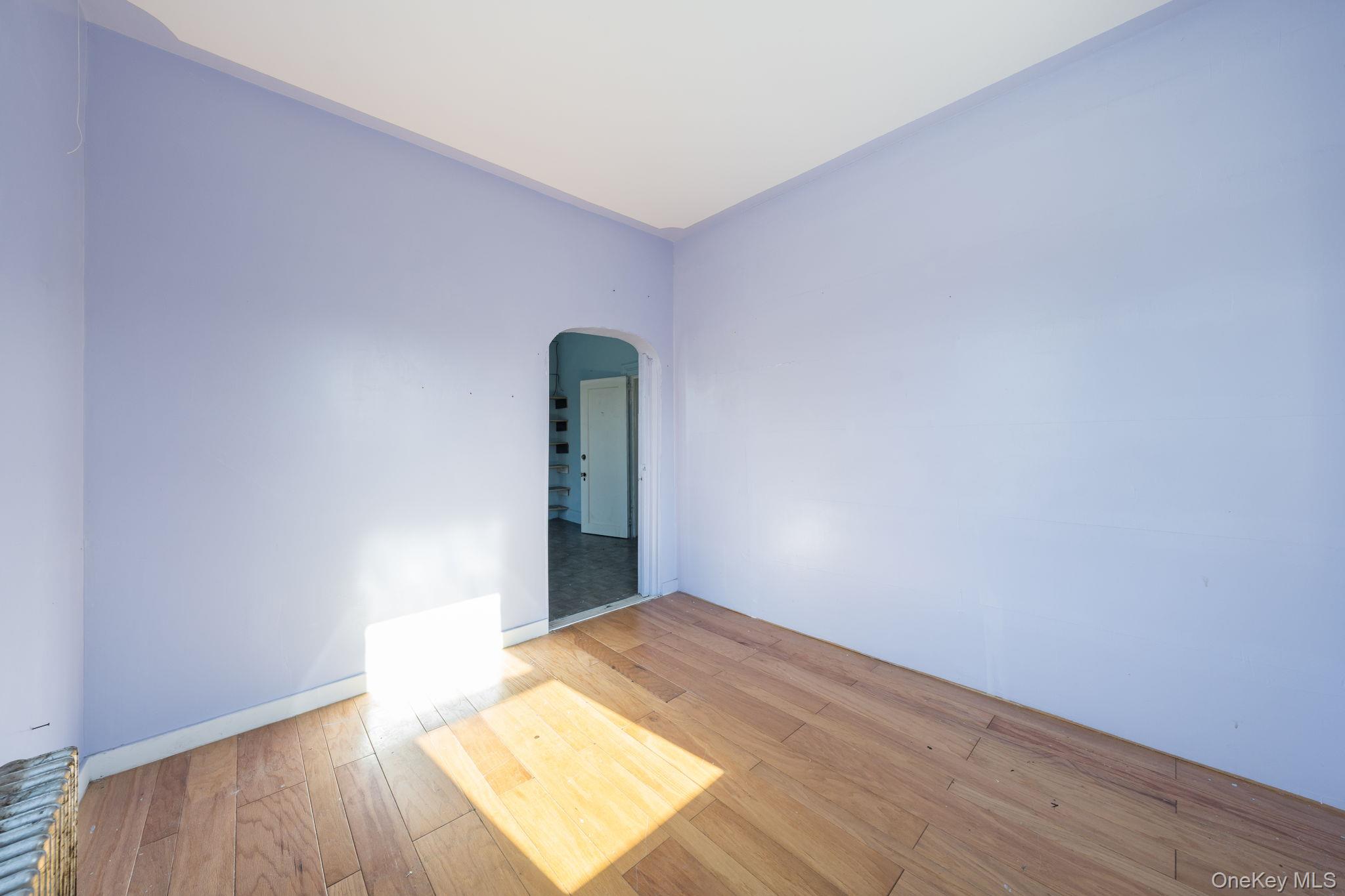 2214 Hermany Avenue Bronx, NY 10473 - Photo 11 of 43 a view of an empty room and window