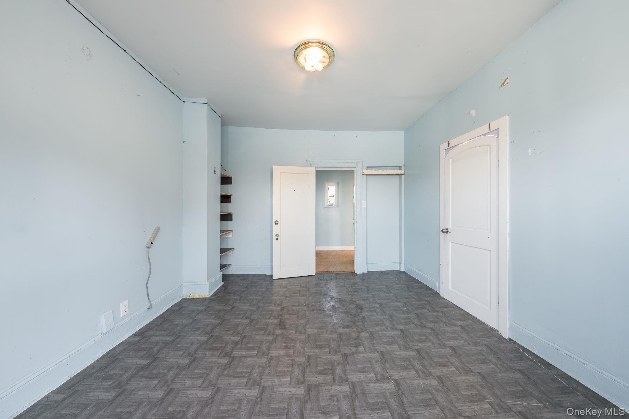 2214 Hermany Avenue Bronx, NY 10473 - Photo 12 of 43 a view of an empty room with a window