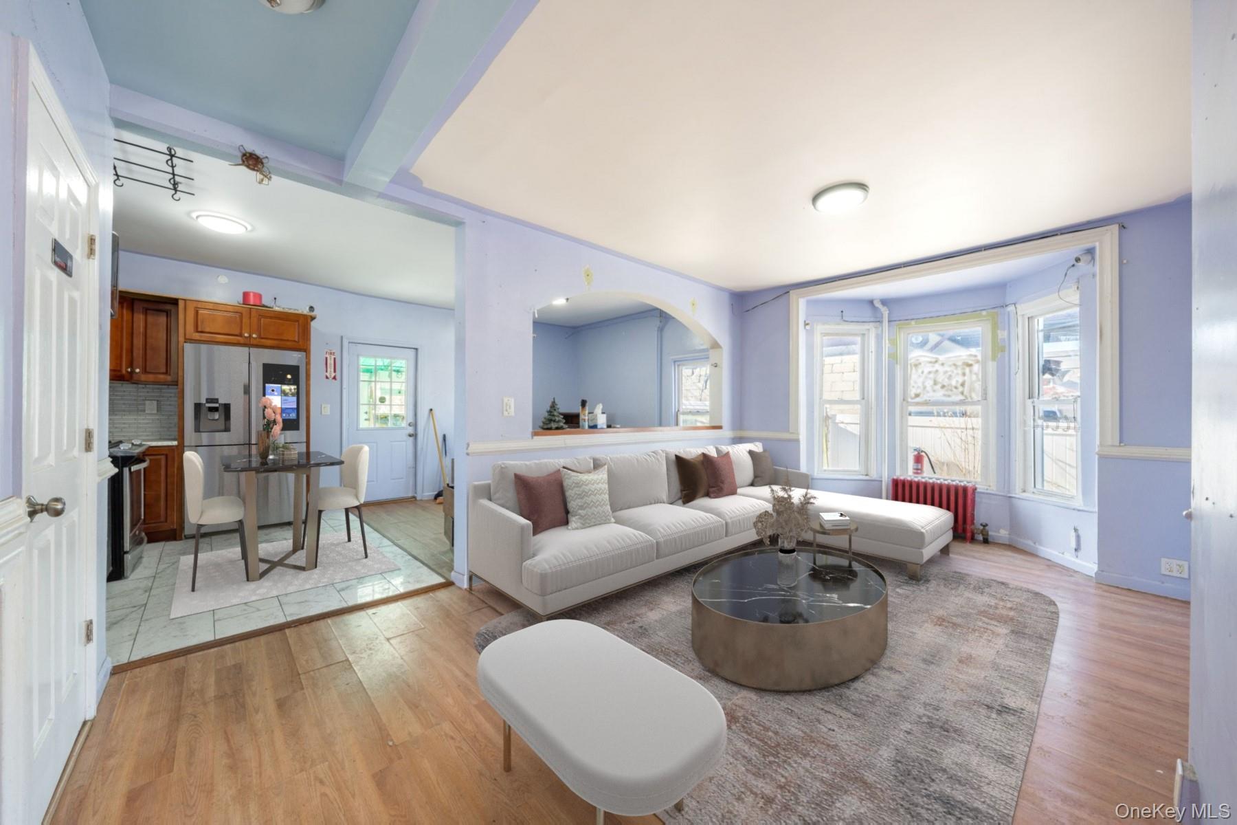 2214 Hermany Avenue Bronx, NY 10473 - Photo 2 of 43 a living room with furniture and wooden floor