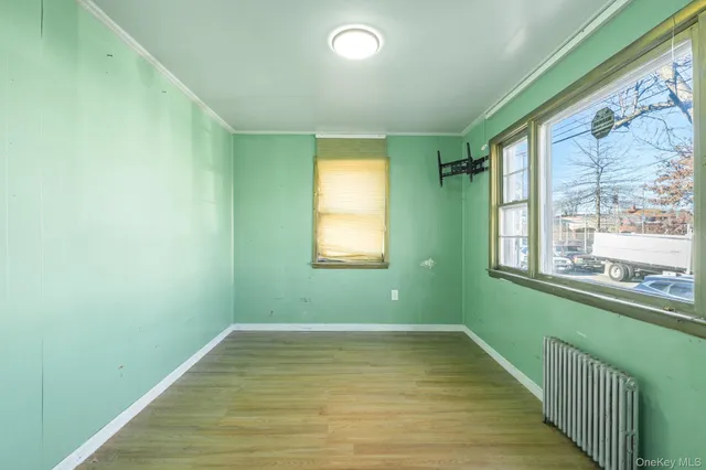 a view of a room with a large window