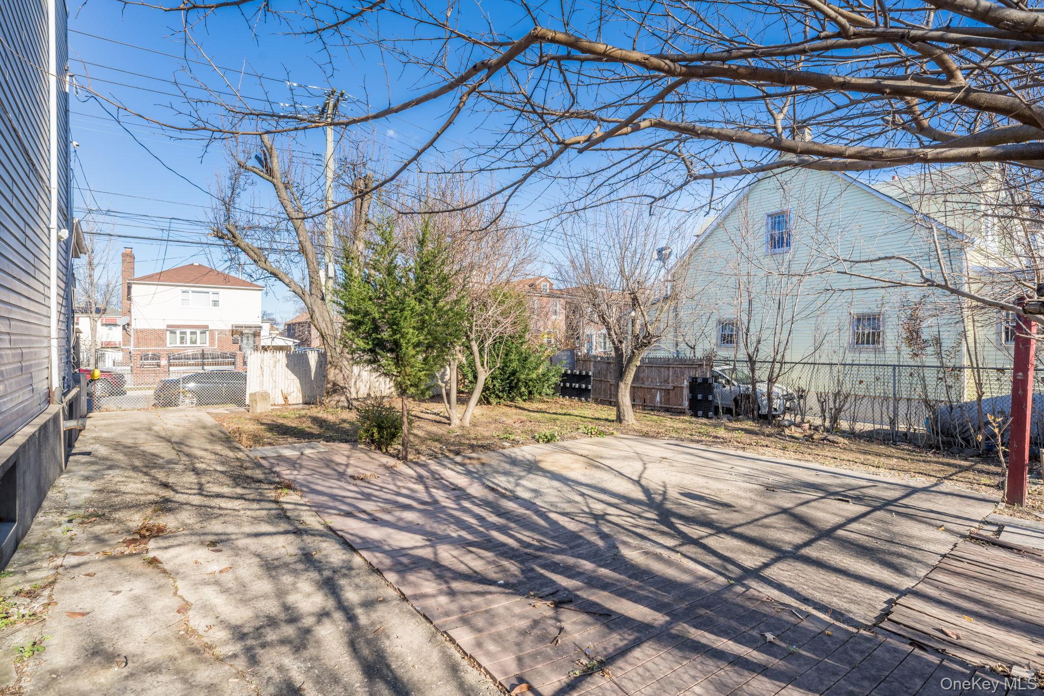 2214 Hermany Avenue Bronx, NY 10473 - Photo 32 of 43 a outdoor view of a house with a street
