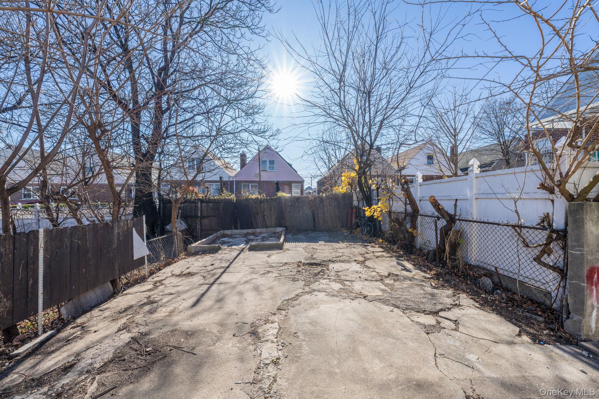2214 Hermany Avenue Bronx, NY 10473 - Photo 34 of 43 a view of a backyard with snow