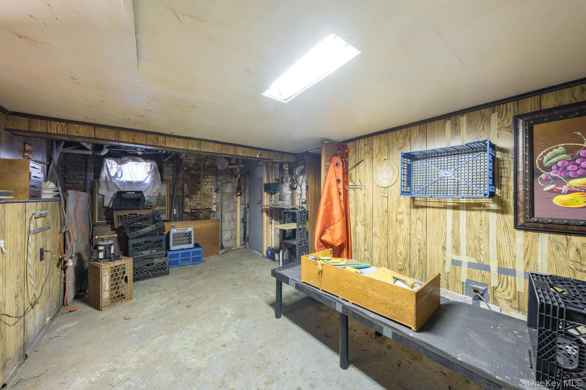2214 Hermany Avenue Bronx, NY 10473 - Photo 40 of 43 a living room with furniture and a flat screen tv