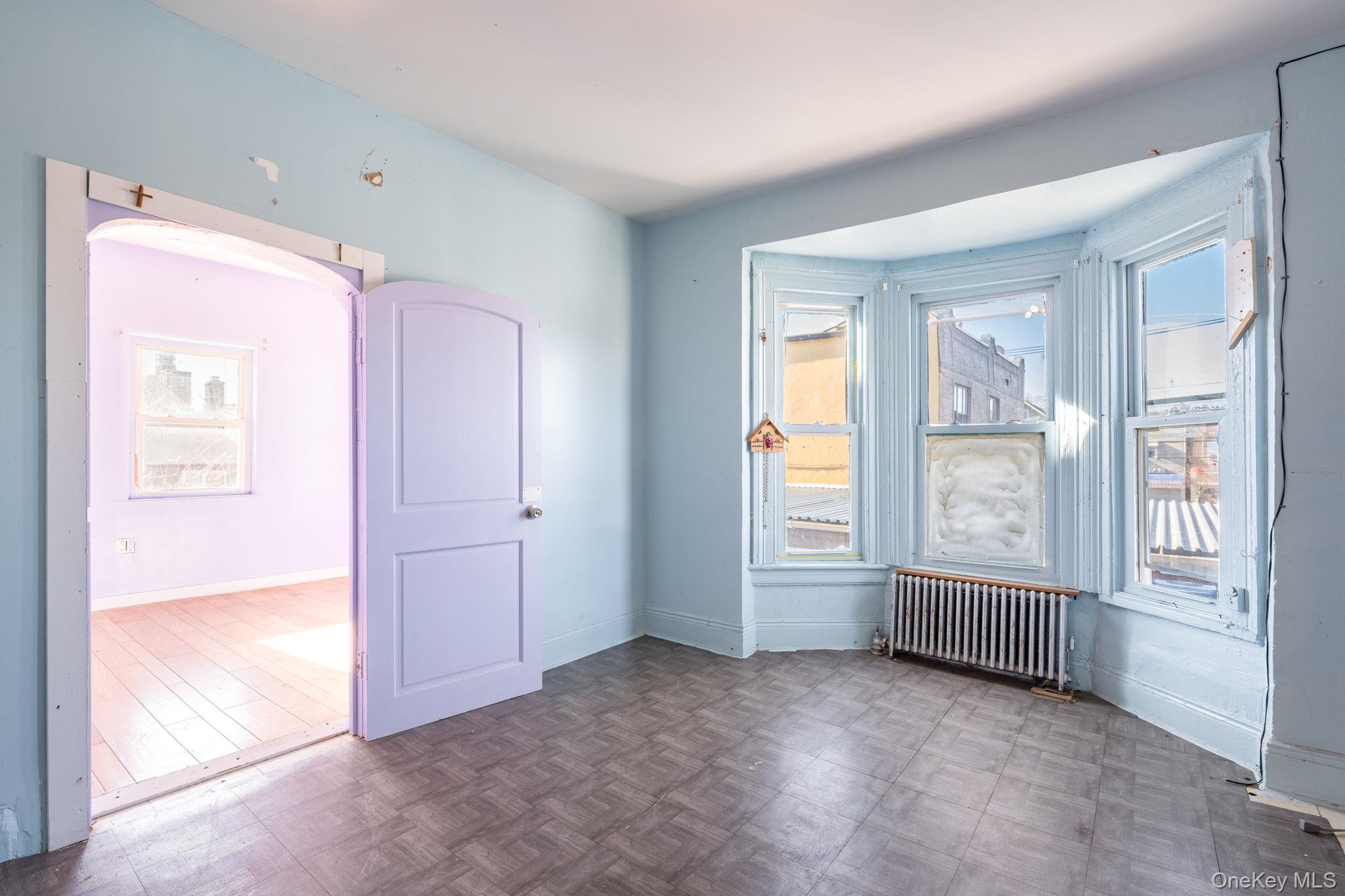 2214 Hermany Avenue Bronx, NY 10473 - Photo 5 of 43 a view of an empty room with a window
