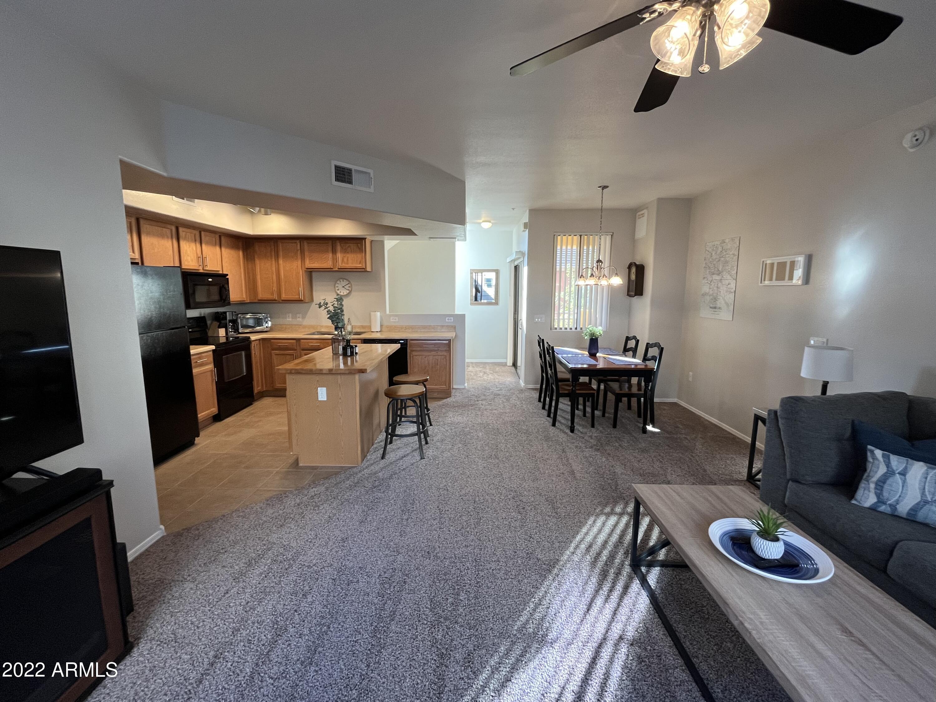 280 South Evergreen Road, Unit 1306 Tempe, AZ 85288 - Photo 2 of 58 Living room / Kitchen
