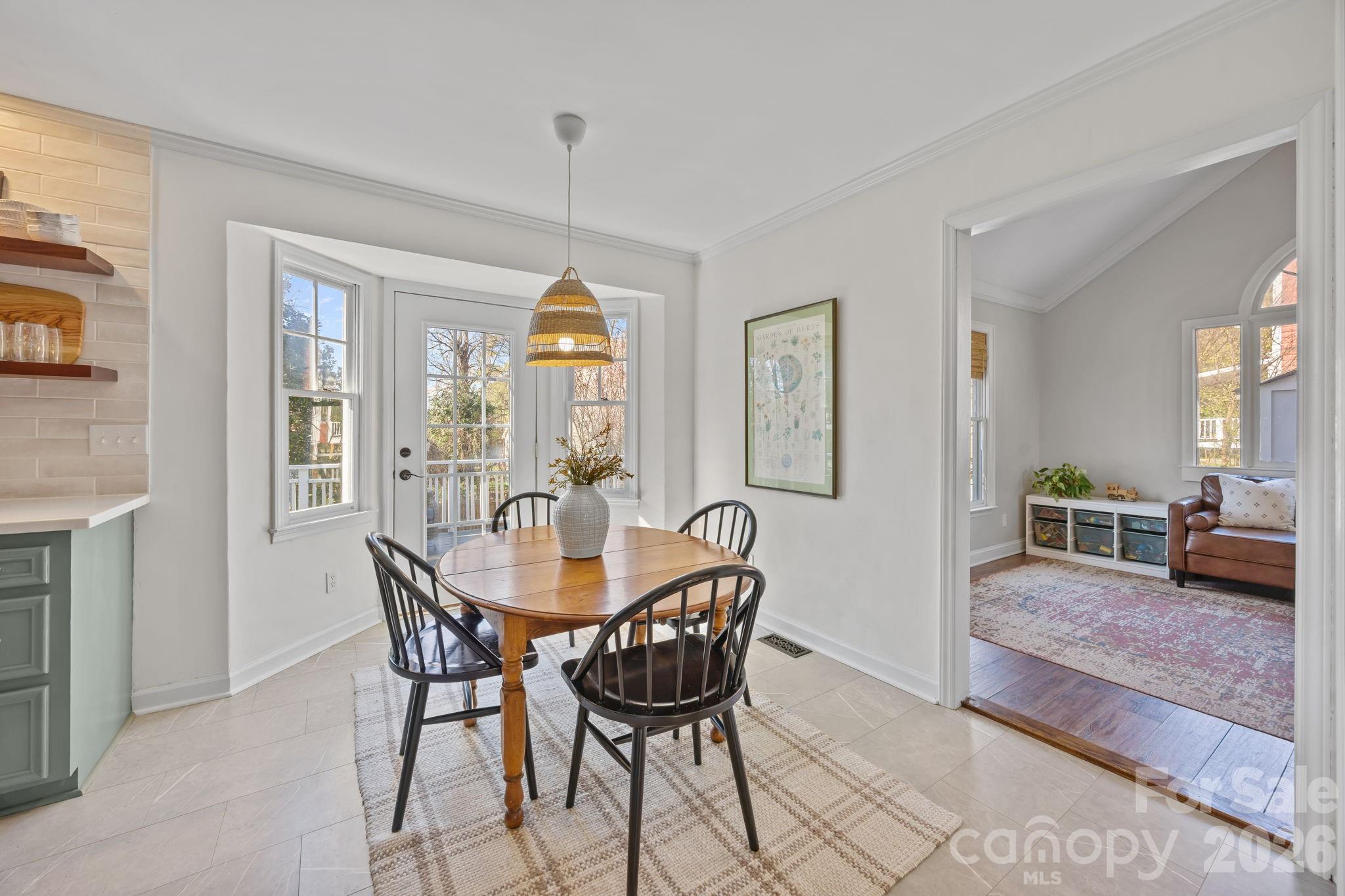 264 Post Oak Avenue Southwest Concord, NC 28025 - Photo 14 of 39 a dining room with furniture and window