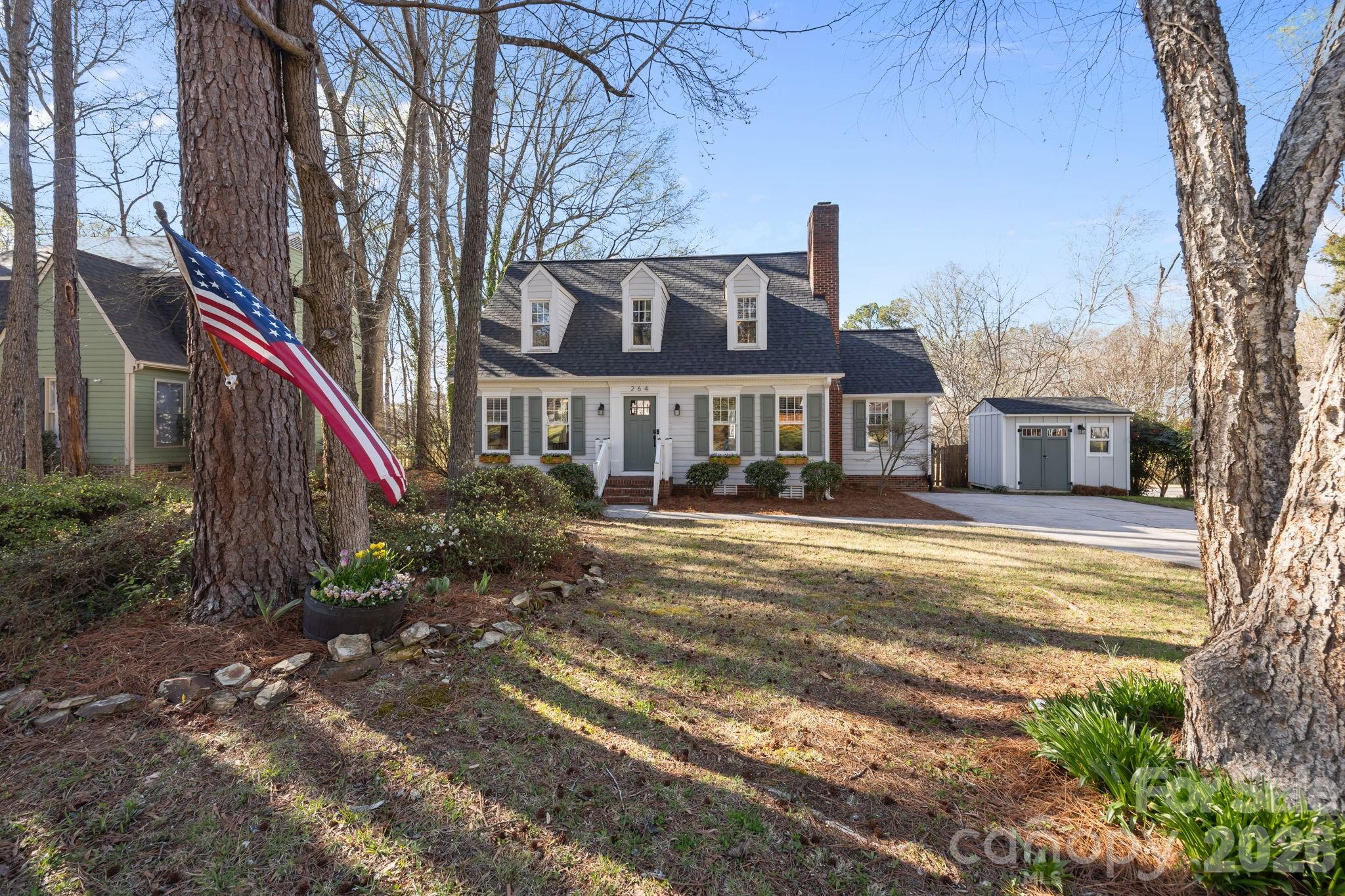 264 Post Oak Avenue Southwest Concord, NC 28025 - Photo 2 of 39 a view of a house with a yard