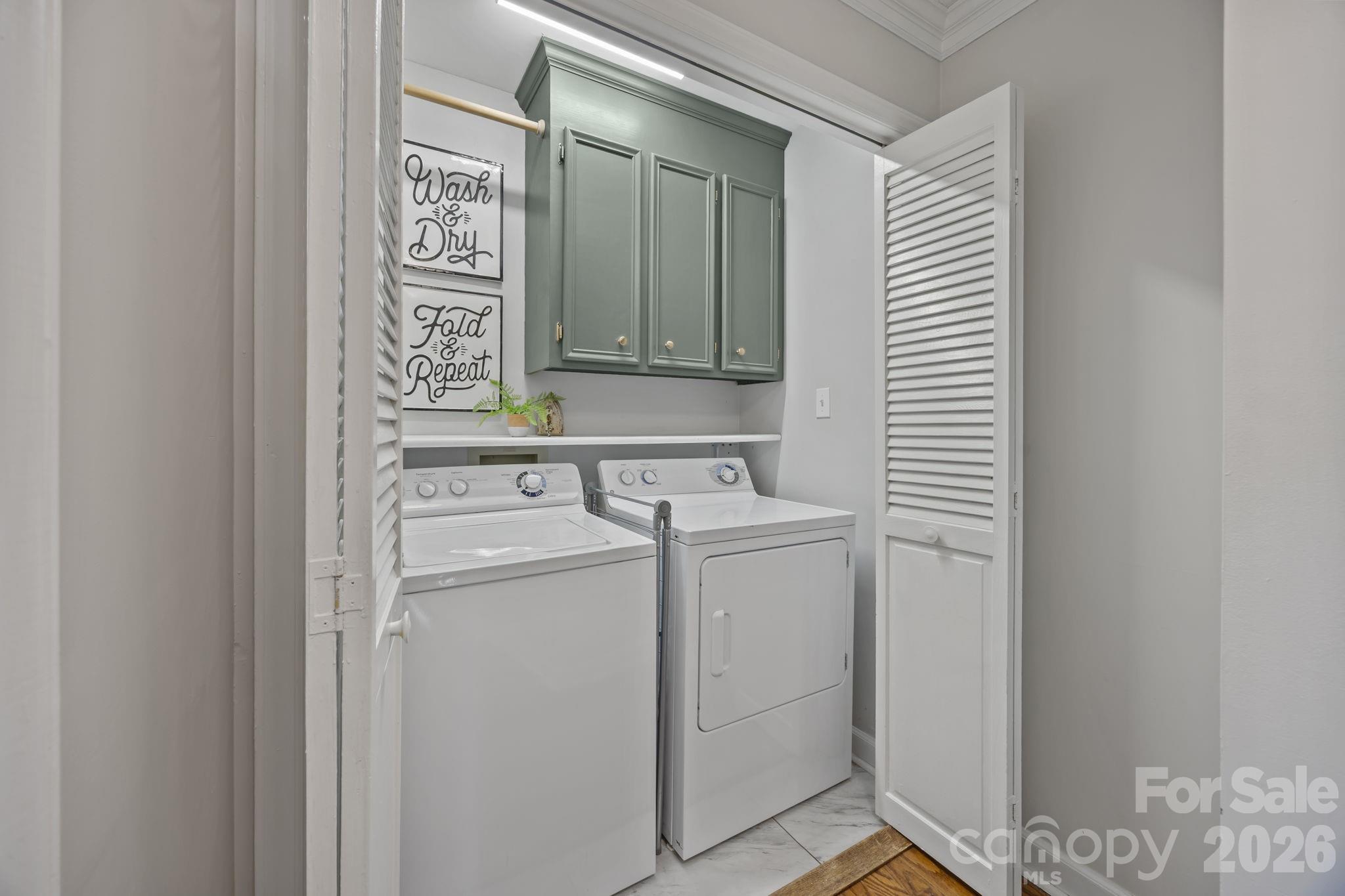 264 Post Oak Avenue Southwest Concord, NC 28025 - Photo 22 of 39 a utility room with dryer and washer