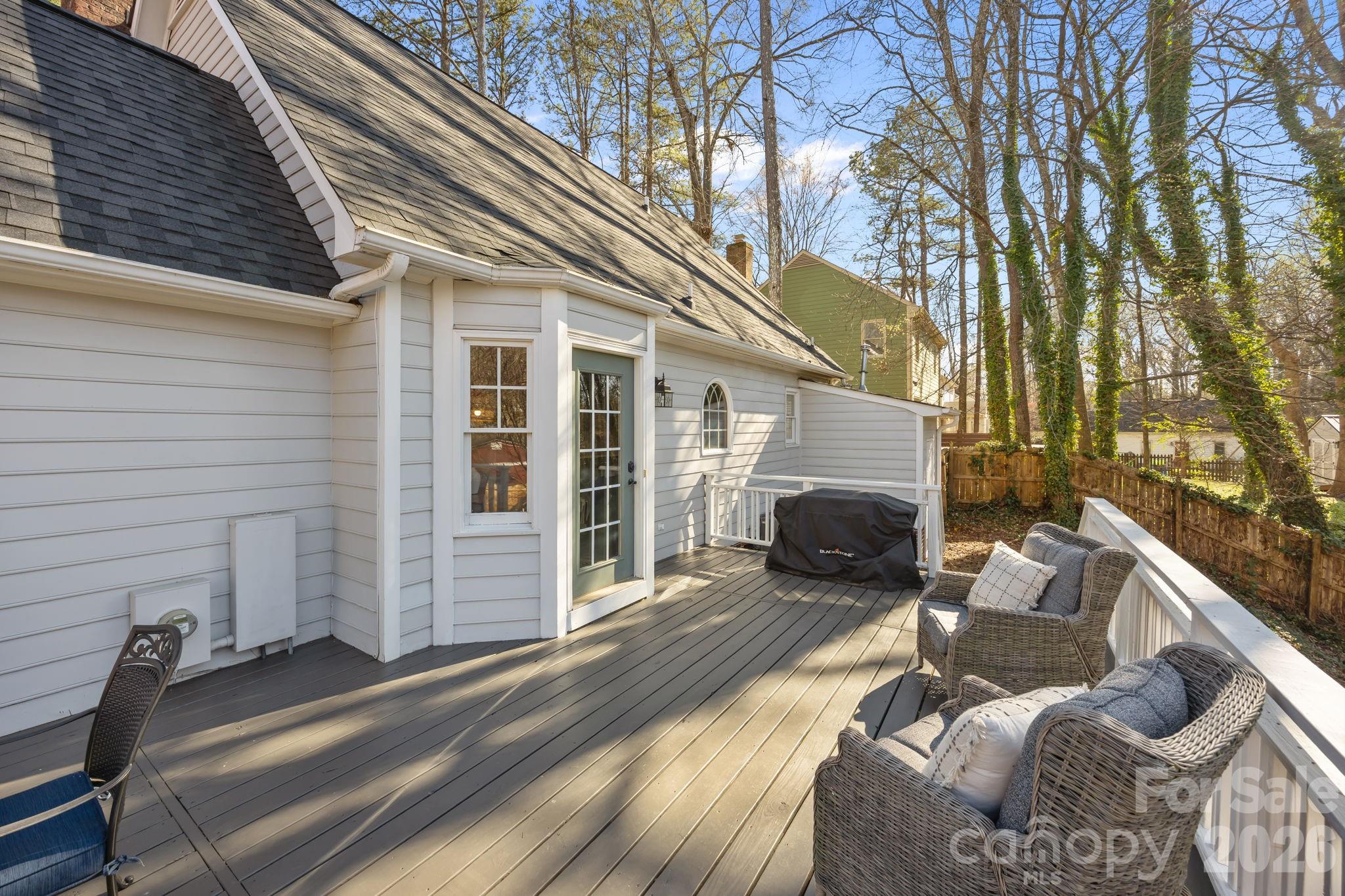 264 Post Oak Avenue Southwest Concord, NC 28025 - Photo 31 of 39 a view of a patio with chair and tables