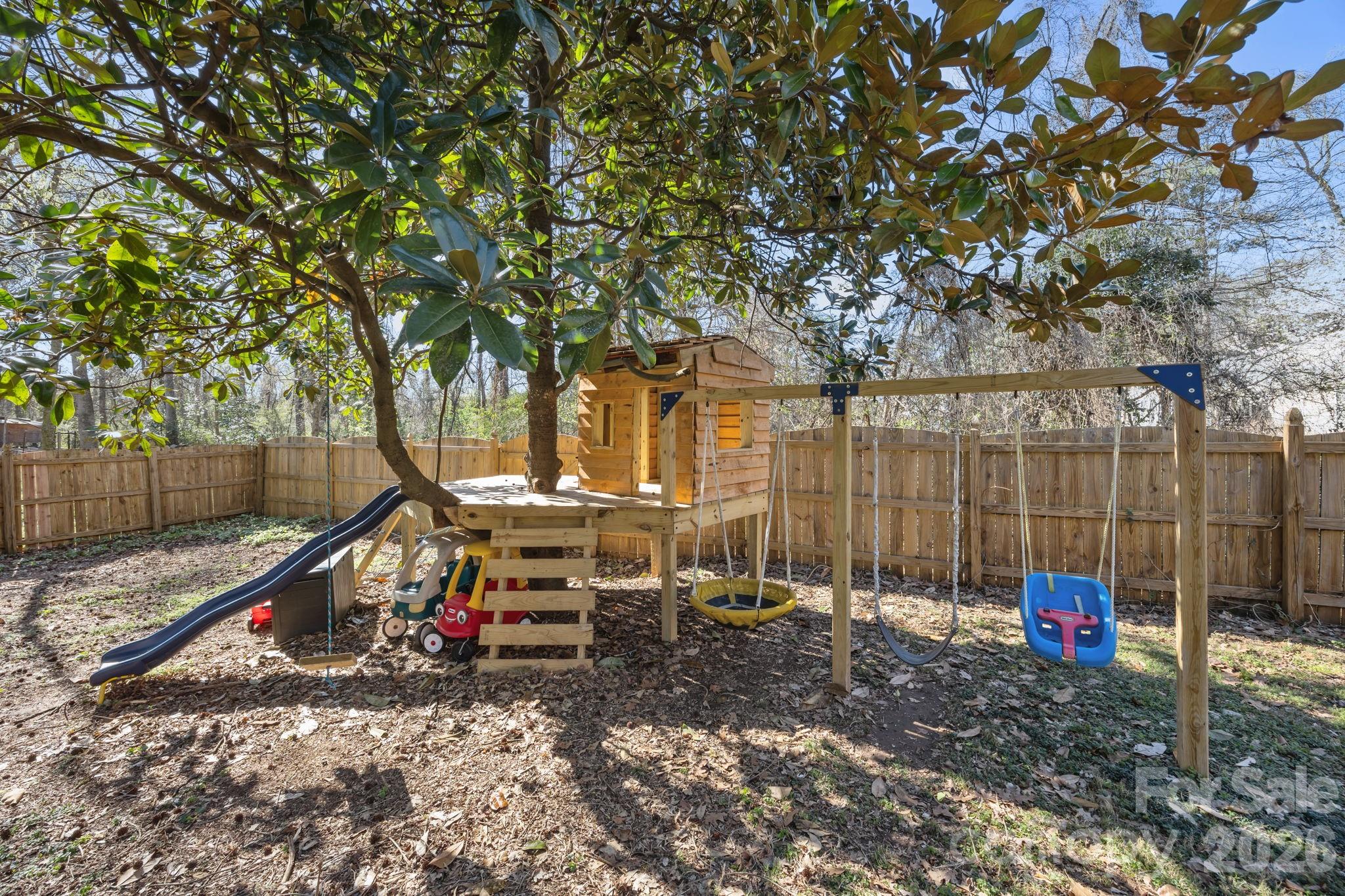 264 Post Oak Avenue Southwest Concord, NC 28025 - Photo 33 of 39 a view of outdoor space with trampoline