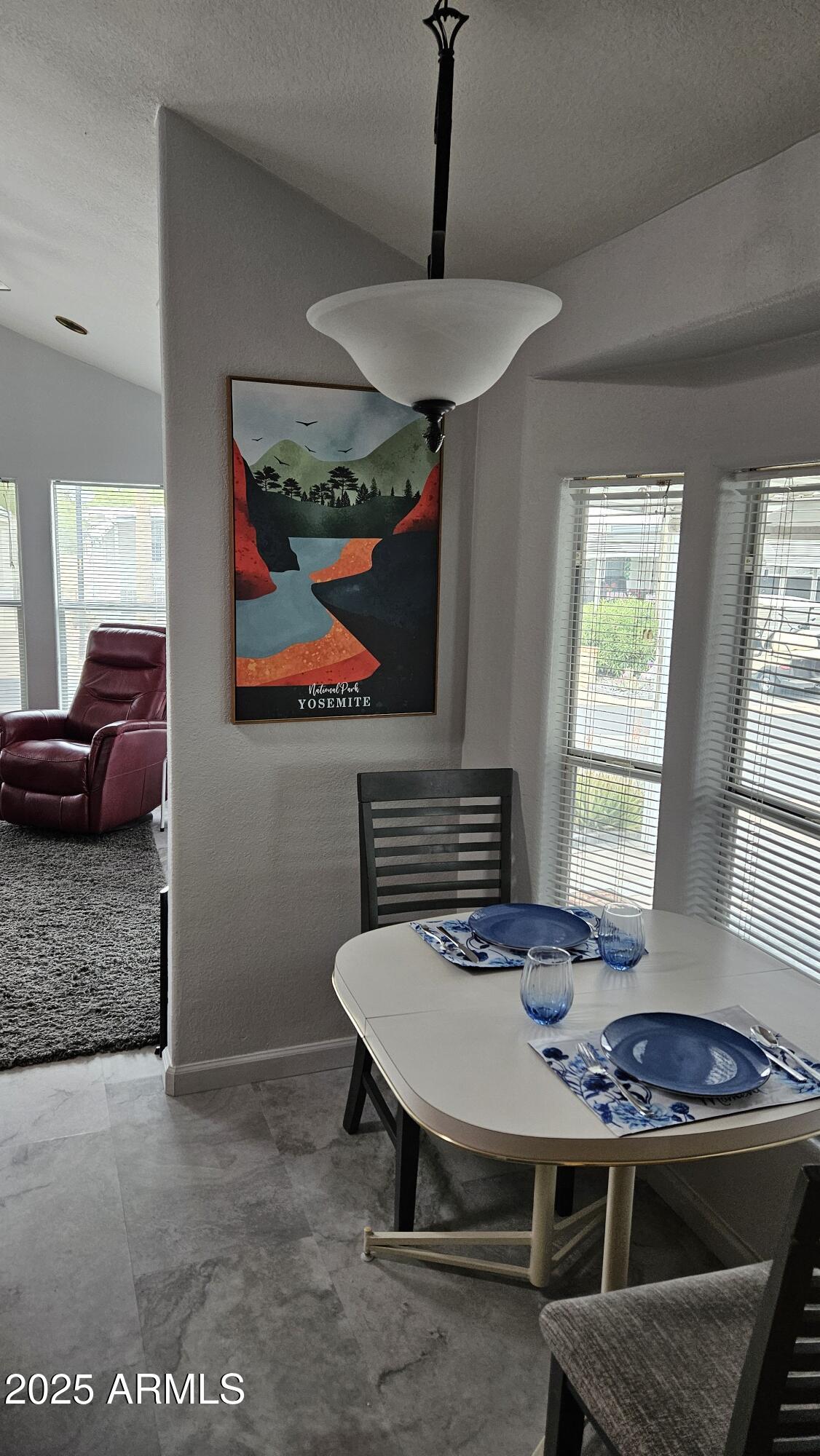 2205 West Klamath Avenue Apache Junction, AZ 85119 - Photo 12 of 36 a room with furniture and window