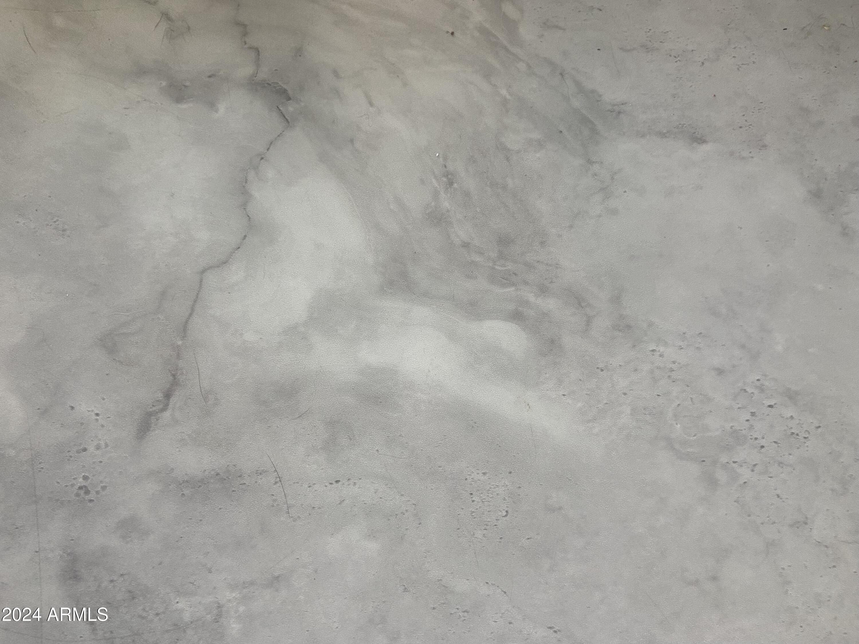 2205 West Klamath Avenue Apache Junction, AZ 85119 - Photo 23 of 36 a close up of a white marble wall