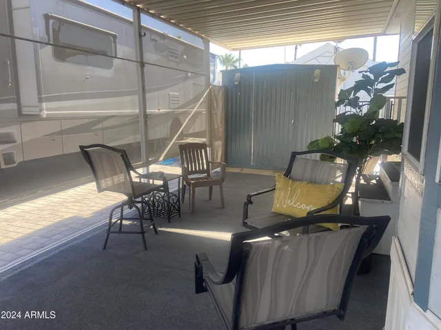 a view of a porch with furniture
