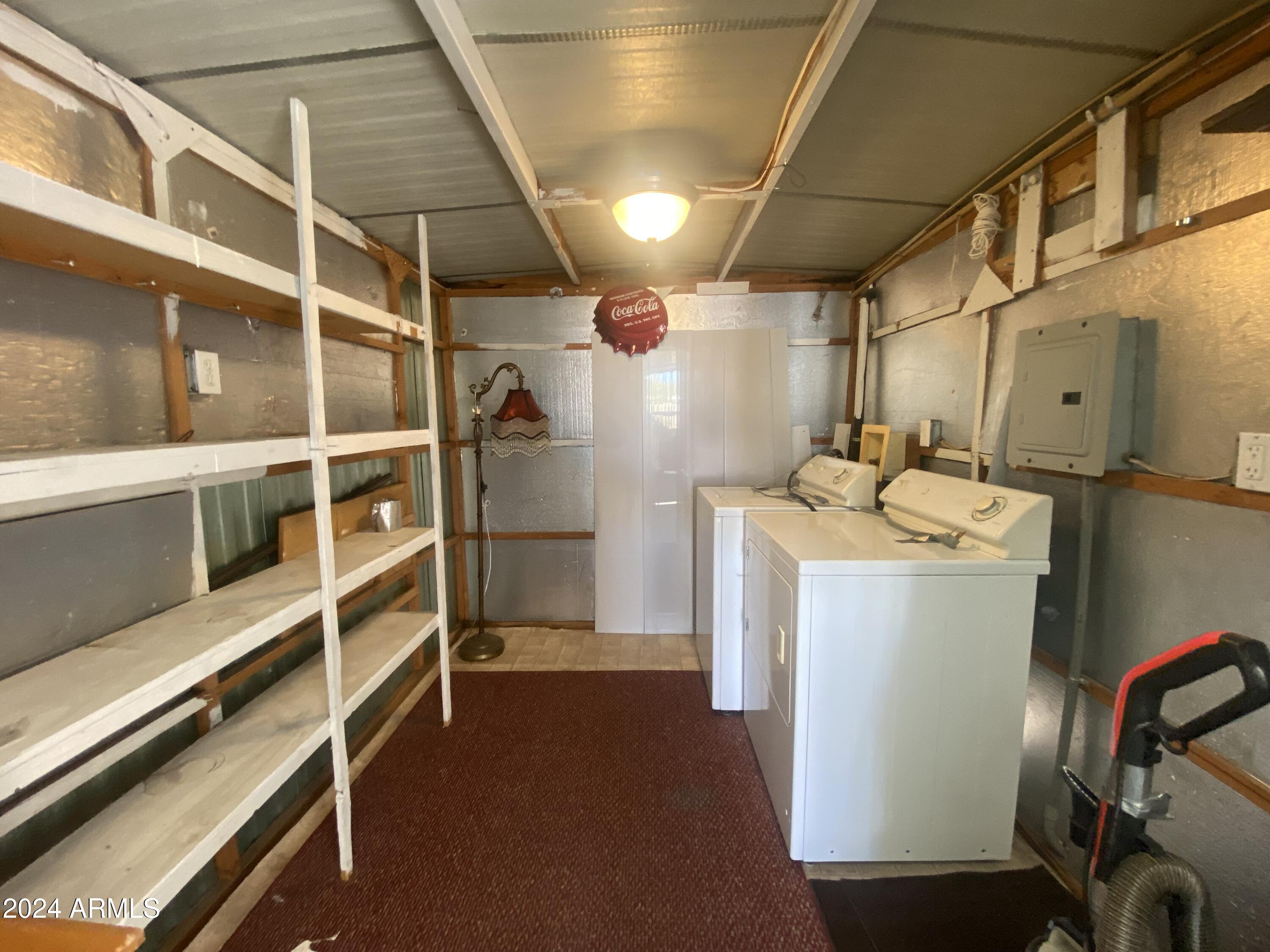 2205 West Klamath Avenue Apache Junction, AZ 85119 - Photo 32 of 36 a utility room with dryer and washer