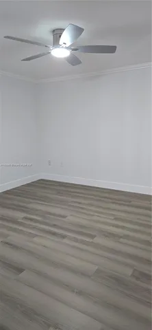 a kitchen with kitchen island a sink counter top and stove