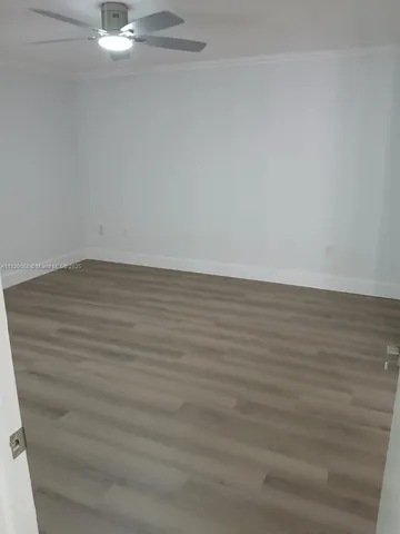a view of a room with an empty space