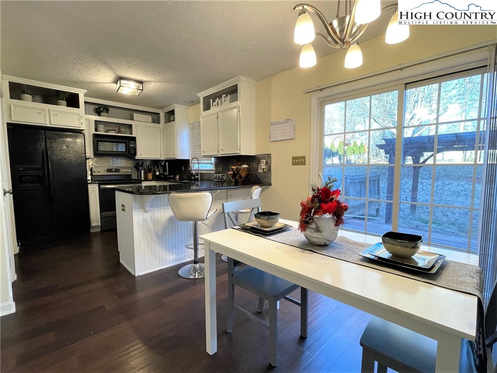 3490 Section House Road Hickory, NC 28601 - Photo 12 of 39 a kitchen with a sink appliances and cabinets