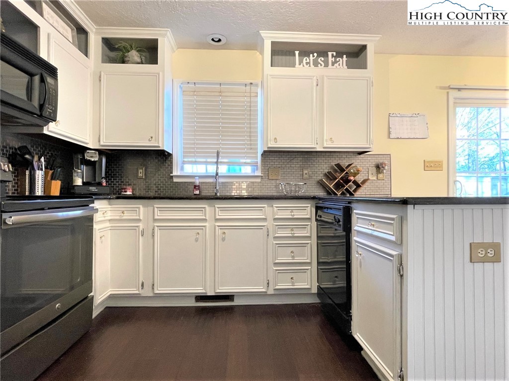 3490 Section House Road Hickory, NC 28601 - Photo 15 of 39 a kitchen with granite countertop white cabinets and white appliances