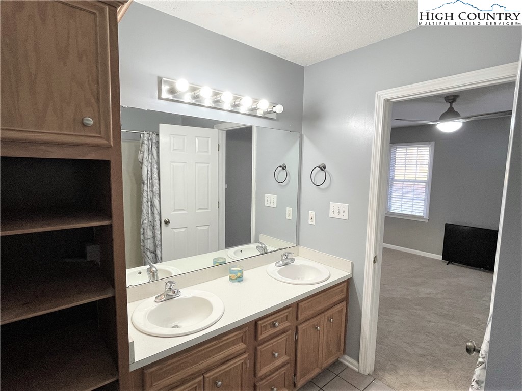 3490 Section House Road Hickory, NC 28601 - Photo 21 of 39 a bathroom with a sink double vanity granite and a mirror